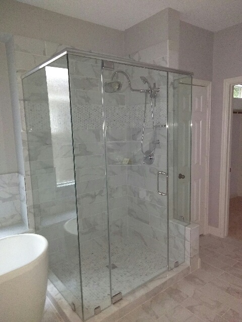 Corner Frameless Enclosure installed by Texan Glass in The Woodlands, TX